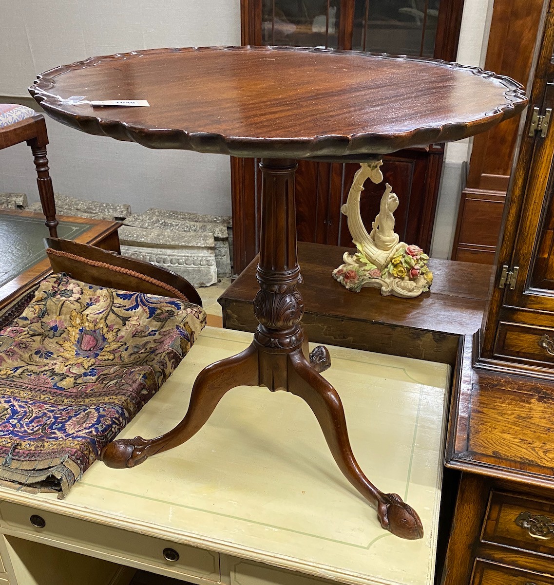 A George III and later circular mahogany tilt top piecrust tea table, diameter 72cm, height 73cm